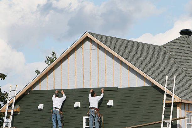 Professional Vinyl Siding technician working in Blain, PA